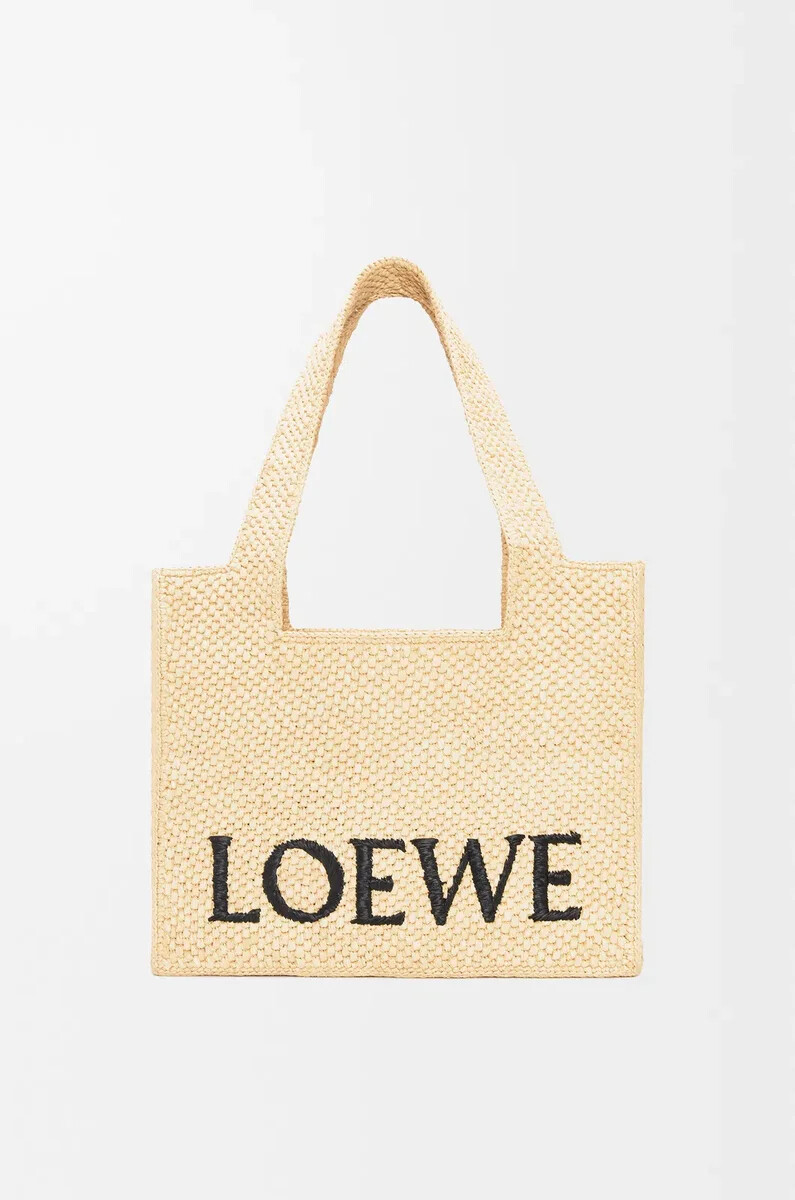 mittelgroße loewe font tragetasche aus bast natur