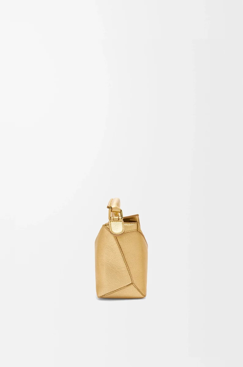 mini puzzle edge tasche aus laminiertem lammleder gold