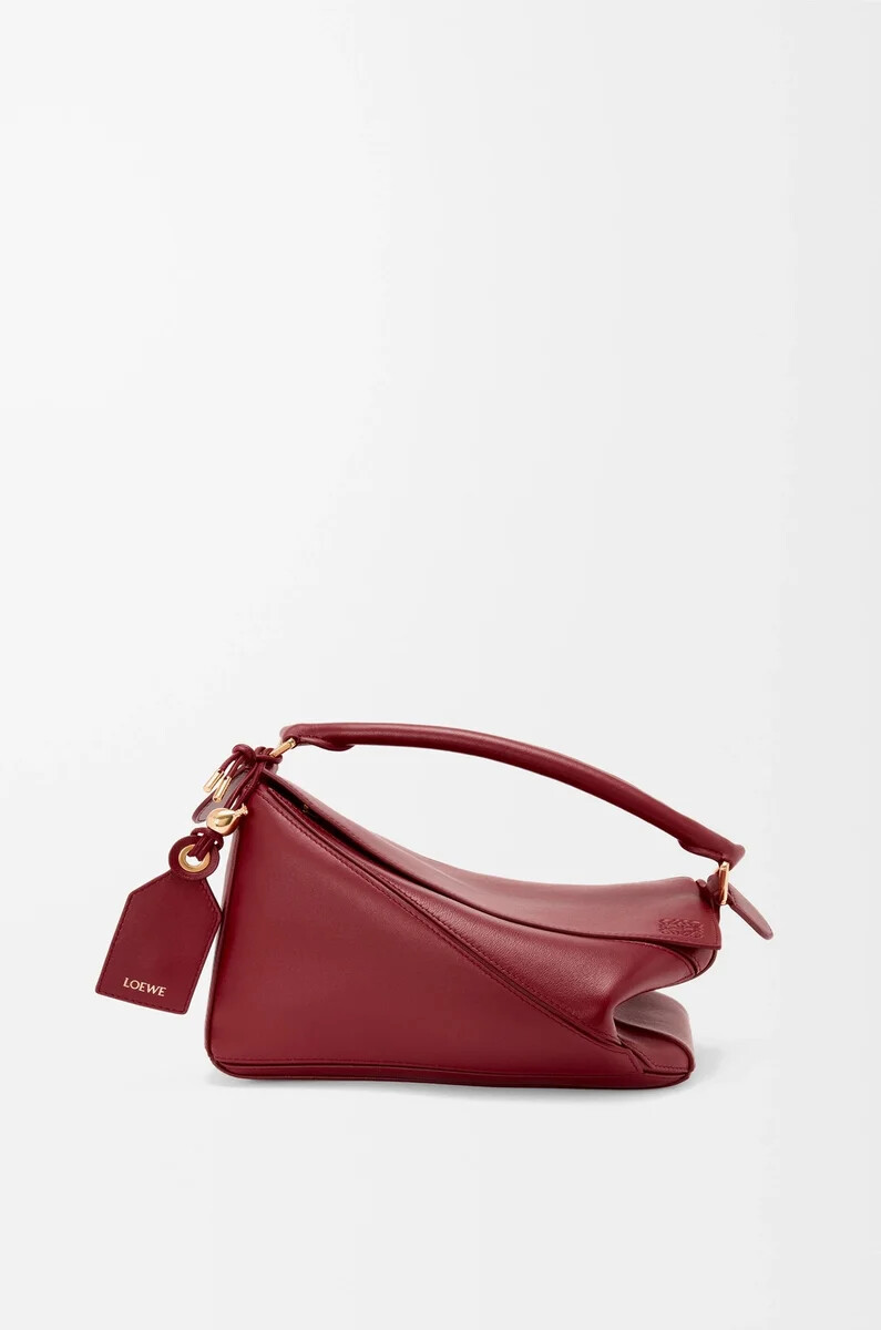 kleine federleichte puzzle-tasche aus nappa-lammleder in der farbe burnt red