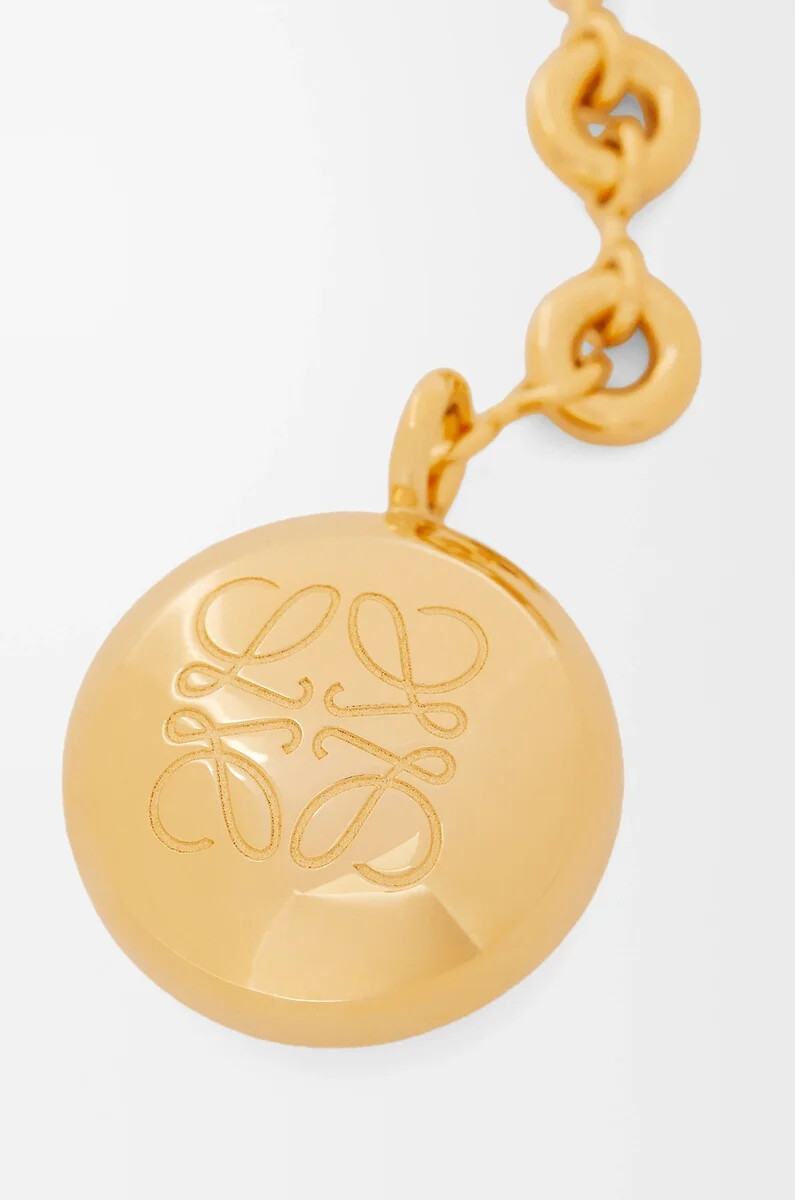kiesel-schlüsselanhänger gold