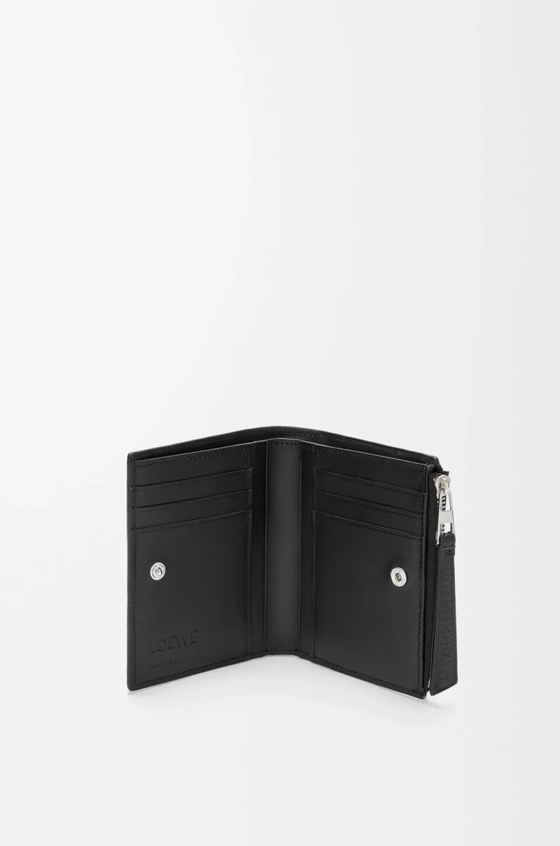 puzzle slim compact wallet aus geschmeidigem genarbtem kalbsleder schwarz