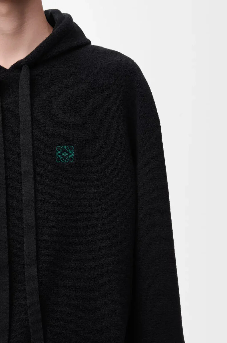 schwarzer wollhoodie